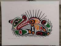 Full view of the print showing the colorful Indigenous-style artwork depicting an otter and sea urchin.