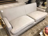 Front view showing full sofa and seat cushions