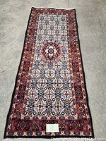 Full-length view of the runner rug laid flat on concrete