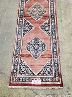 Full view of runner laid flat showing overall pattern and dimensions