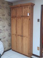 Full front view of custom oak cabinet showing six doors