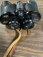 Top view of Swift Audubon binoculars showing model and branding on lenses.