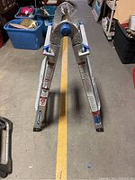 Photo of Werner aluminum multi-position ladder in an A-frame position showing general condition