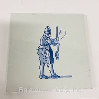 Front view of antique Delft tile showing blue painted soldier figure in traditional uniform holding a pole weapon.
