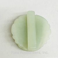 Back of the carved jade belt holder showing the attachment bar for a belt.