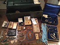 Overview of entire jewelry lot on tabletop