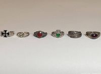 Overview photo showing all six rings in a row including various stones and designs