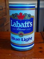 Front view of the Labatt's Blue Light Pilsener can, showing labeling and condition.