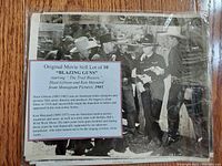 Photo of one promotional still with label explaining the movie and actors.