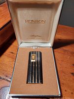 Vintage Ronson butane lighter in original display box with satin and velvet lining.