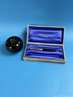 Parker 51 mechanical pencil in original box with blue satin interior and Parker branding.