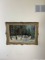 Full view of the framed oil painting hung on a wall