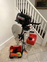 Full view of motor on stand with accessories laid out