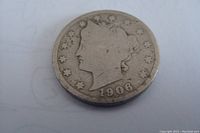 Obverse side of 1906 Liberty Head Nickel displaying the Lady Liberty profile with stars and date.