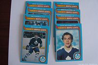 Front view of 10 Toronto Maple Leafs hockey cards including Bruce Boudreau, Jerry Butler, Ian Turnbull, Ron Ellis, Joel Quenneville, Mike Palmateer, Dave Hutchinson and Dave Williams.