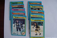 Front view of the vintage NHL hockey cards featuring player photos and team designs in blue bordered style