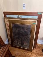 Three Asian themed prints stacked together showing frames and artwork styles