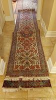 Full view of runner laid down in hallway