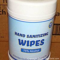 Close-up image of a single tube labeled Sunscope Hand Sanitizing Wipes with 75% alcohol, showing the product details on the label.