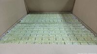 Open box showing rows of light green 1.5" rockwool starter plugs