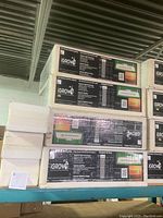 Stack of unopened iGrow IGF-200-BL boxes on shelving