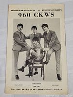 Black and white flyer showing Beatles band photo with names and radio show details for 960 CKWS Kingston Ontario.