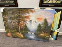 Full view of the primary landscape painting depicting forest, waterfall, mountains, and sky, signed by Costeau.