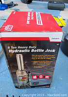 Box of the 8 Ton Heavy Duty Hydraulic Bottle Jack with product image and detailed text on capacity and features