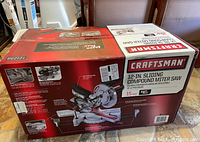 Front of closed original box showing Craftsman branding and saw image