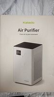 Front of the product box showing the Kalado Air Purifier product image and branding.