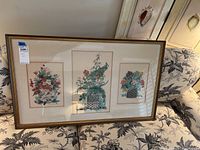 Full view of framed triptych floral lithograph artwork by Jeni Berringer, depicting three vases with colorful flowers in watercolor style.