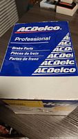 Photo showing the ACDelco branded box with Professional Brake Parts labeling.