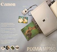 Canon Pixma MP160 packaging box showing printer image and feature highlights including photo print, copy, and scan capabilities.