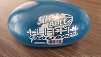 Blue Skyball brand football with printed logo on its surface.
