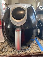 Front view of black Power Air Fryer XL with silver handle and digital control panel