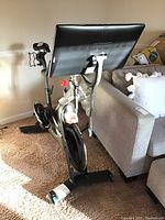 Side view showing console, frame, pedals and attached shoes