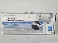 Box of Beautural Handheld Garment Steamer showing product image and key features