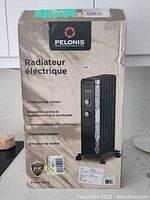 Photo of the Pelonis electric radiant heater box front with product image and French product features