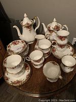 All pieces arranged on table showing full set