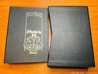 Black album cover with gold letters 'Covers Marquis II'