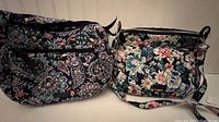 Both Vera Bradley quilted satchels side by side showing their overall look and pattern