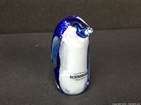 Blue and white penguin glass figurine signed Schroders