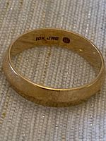 Interior of band showing “10K JMC” hallmark