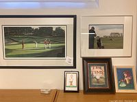Overview of all five framed golf prints arranged on a wall and surface showing various golf scenes and themes.