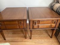 Pair of Kroehler wood end tables side by side on hardwood floor