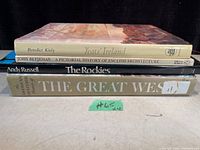 Stack view of the four books showing spines: Yeats' Ireland, English Architecture, The Rockies, The Great West.