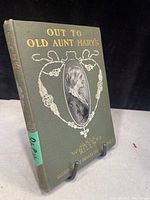Front cover of the book showing gold embossed title and illustration.