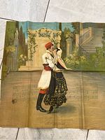 Full view of printed fabric panel with dance couple, scenic backdrop, and music notes.