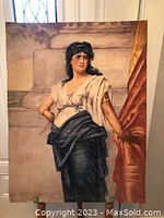 Full view of oil painting showing woman in draped clothing against a stone architectural background and an orange curtain.