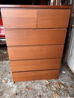 Front view of the Ikea Malm dresser showing wood finish and drawer layout